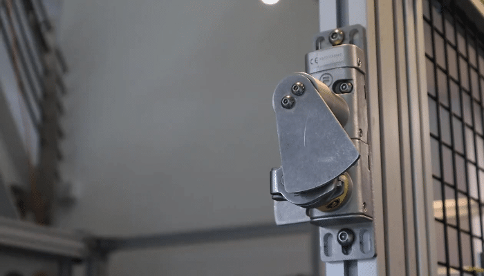 Osbourn blocking device for interlocks mounted on fencing, demonstrating a proactive inhibit function