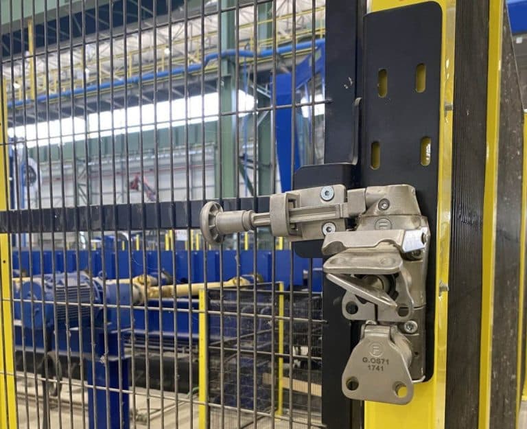 mGard door lock module mounted to guarding on-site.
