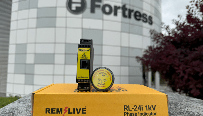 Yellow and black Remlive Phase Indicator, designed to reduce electrical hazards, displayed outside Fortress Safety HQ.