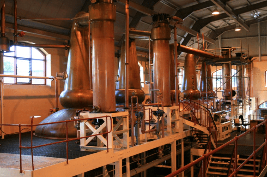 Safety interlock units installed on equipment in a whiskey distillery