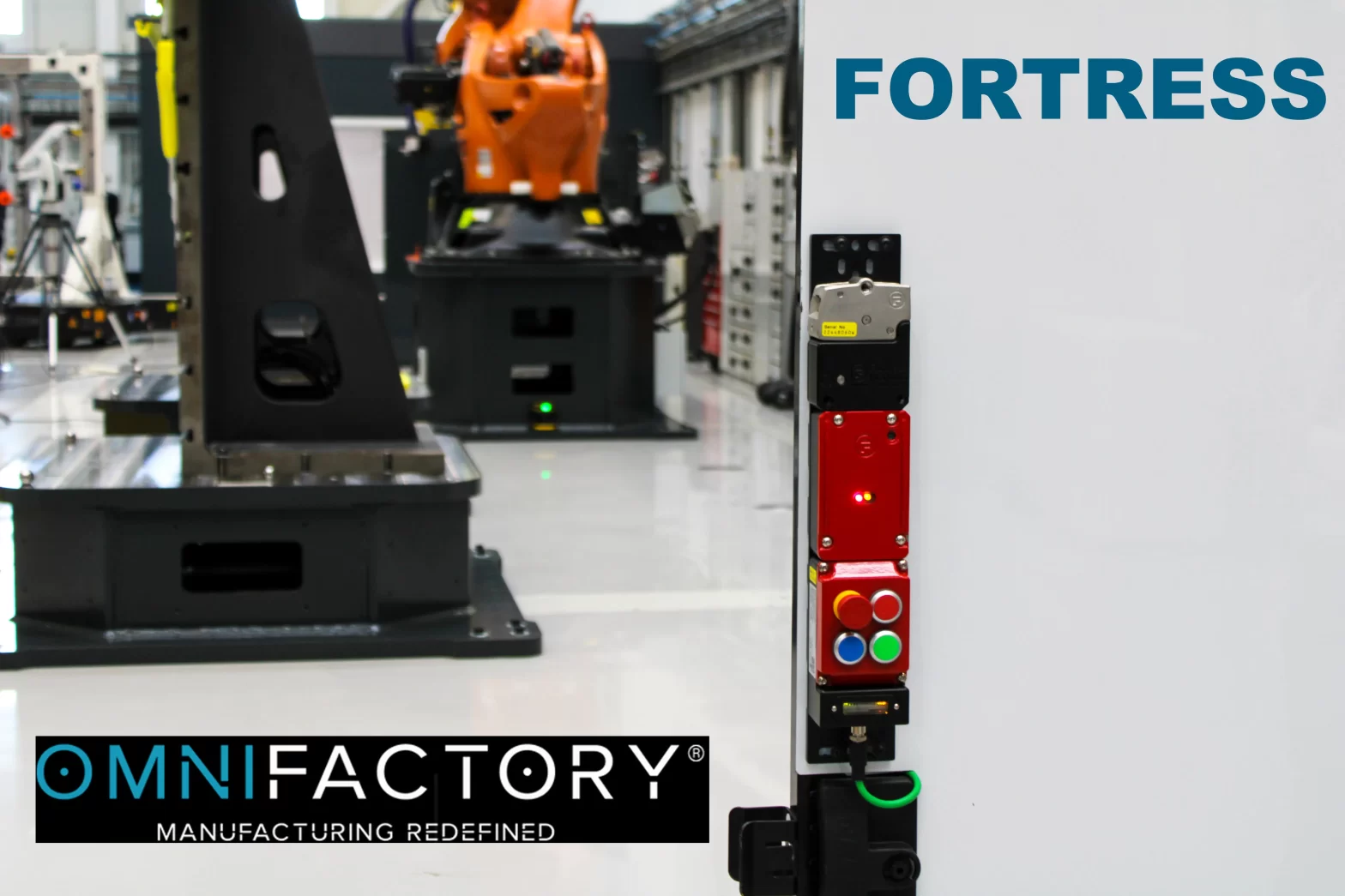 amGardpro unit mounted to guarding with factory floor in background and Omnifactory and Fortress logo in opposite corners